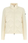 the moncler cardigan redefines the concept of hybrid outerwear through a sophist