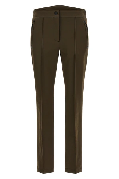 the moncler grenoble trousers redefine alpine clothing through a tight silhouett