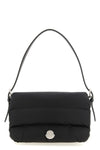 the moncler caradoc shoulder bag translates the brands iconic aesthetic into