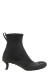 the dive loewe ankle boots redefines the codes of contemporary elegance throug