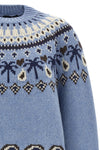 the alanui sweet winter sweater reinterprets traditional knitwear through meti