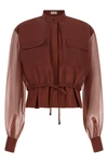 the brunello cucinelli blouse exemplifies the brands mastery in material contra