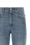 brunello cucinelli retro jeans redefine casual wear through rigorous sartorial