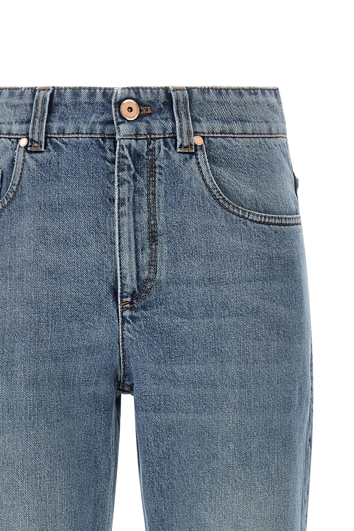 brunello cucinelli retro jeans redefine casual wear through rigorous sartorial