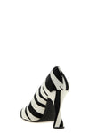 moschino zebra print pony hair pumps redefine the codes of formal footwear throu