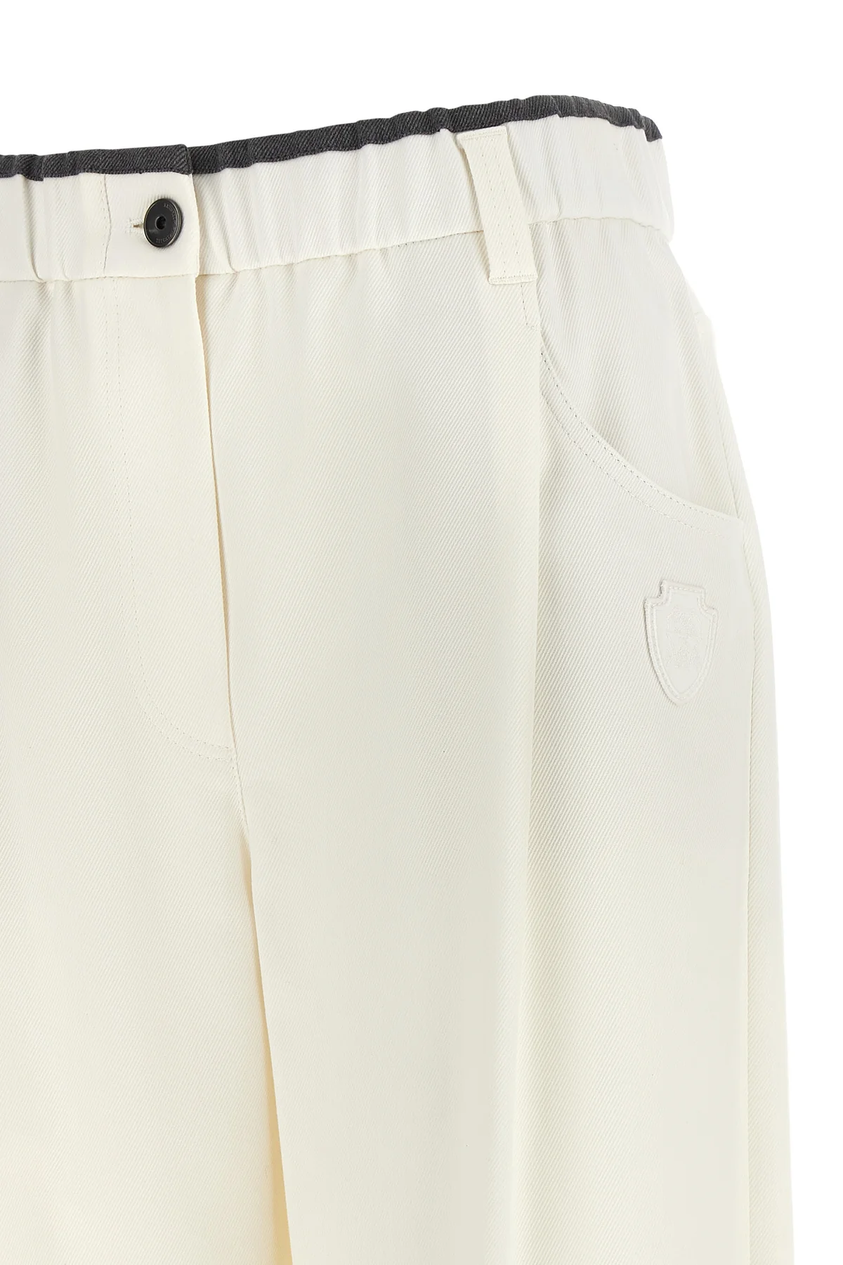brunello cucinelli trousers redefine the codes of everyday elegance through a re