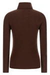 the fabiana filippi turtleneck redefines the concept of knitwear through a tight