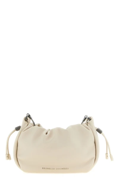 the brunello cucinelli bucket mellow mini shoulder bag stands out for its soft