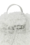 moschinos tie me small handbag stands out for its soft and unstructured silho