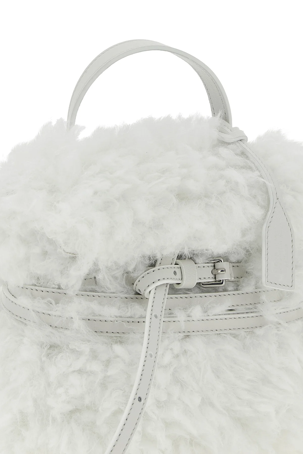 moschinos tie me small handbag stands out for its soft and unstructured silho