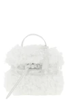 moschinos tie me small handbag stands out for its soft and unstructured silho