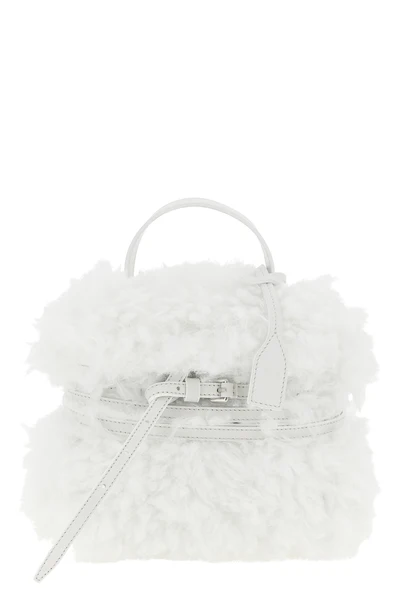 moschinos tie me small handbag stands out for its soft and unstructured silho