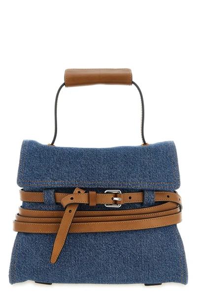 the moschino tie me regular handbag in structured blue denim stands out for a