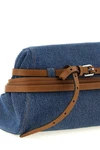 moschinos large tie me cotton denim clutch stands out for its unstructured si