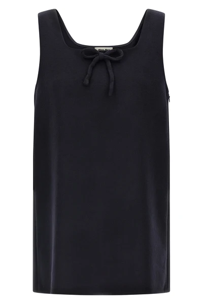 the miu miu waxed double wool short dress redefines the codes of contemporary
