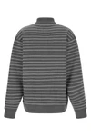 the miu miu striped polo shirt redefines casual luxury through a precise sartori