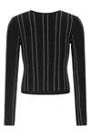 the elisabetta franchi cardigan stands out for a sartorial construction defined