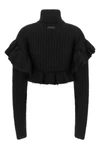 the elisabetta franchi sweater redefines the volumes of contemporary knitwear th