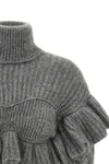 the elisabetta franchi cropped sweater redefines knitwear through a sculptural c