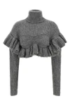 the elisabetta franchi cropped sweater redefines knitwear through a sculptural c
