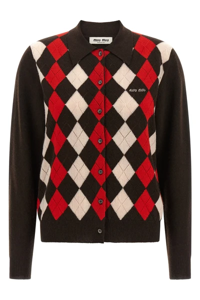 the miu miu cardigan redefines the codes of classic knitwear through a structure