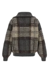 the double dazzling tartan cardigan by brunello cucinelli reinterprets outerwe