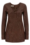 the miu miu dress defines a new sartorial aesthetic through a rigorous material