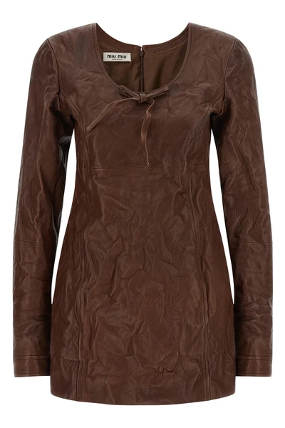 the miu miu dress defines a new sartorial aesthetic through a rigorous material