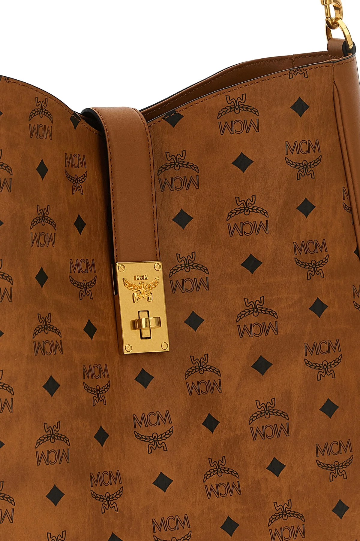 the large mcm tracy shoulder bag defines a structured aesthetic through the ic