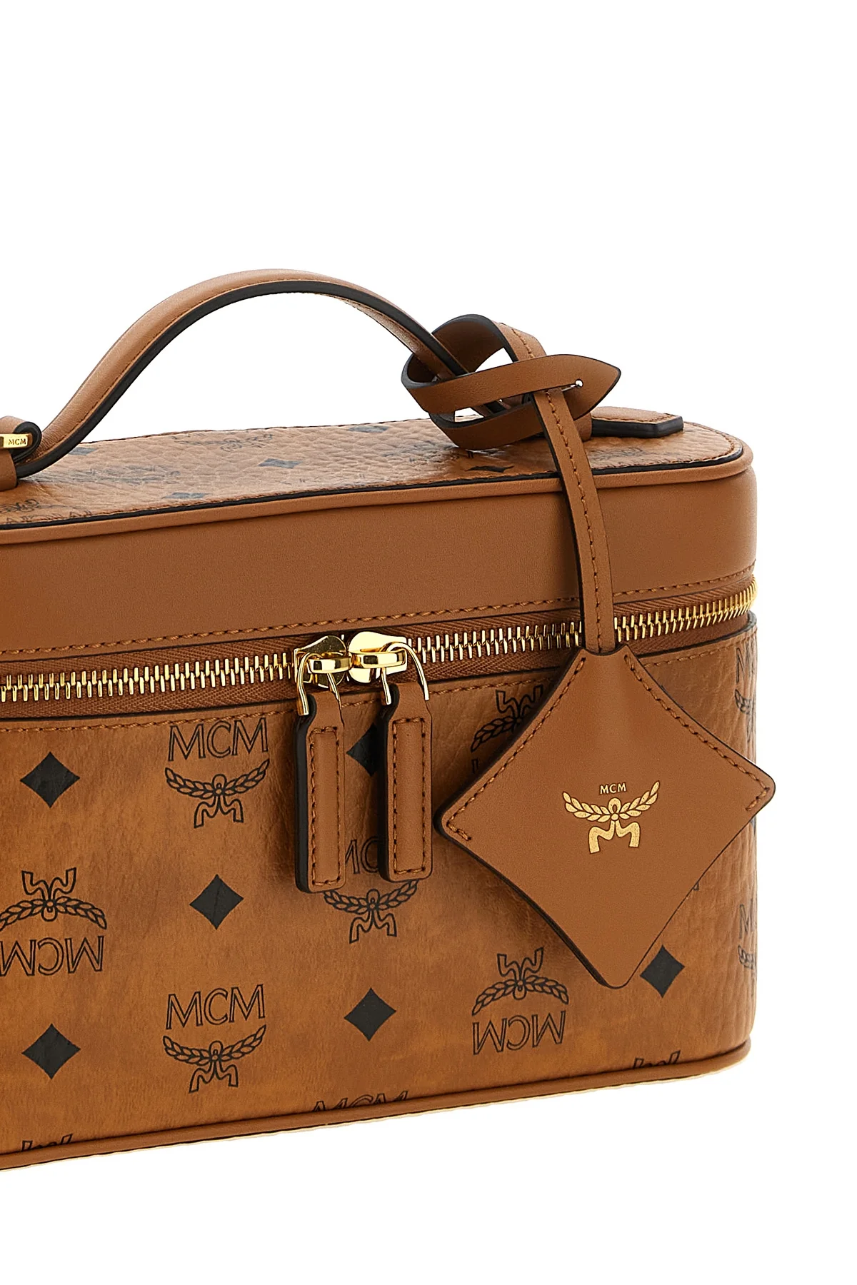 the mcm aren crossbody bag defines a structured silhouette inspired by classic