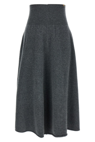 the extreme cashmere n°388 ease midi skirt redefines everyday luxury through a