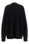 the extreme cashmere n°517 simo cardigan redefines knitwear volumes through a