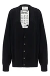 the extreme cashmere n°517 simo cardigan redefines knitwear volumes through a