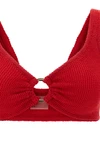 the hunza g nadine bikini redefines beachwear through a precise study of textu