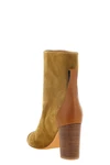 odissi dot ankle boots have a structured ankle silhouette