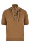 the prada short-sleeved sweater redefines luxury knitwear through sophisticated