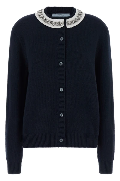 the prada cardigan in fine navy blue yarn embodies timeless elegance through une