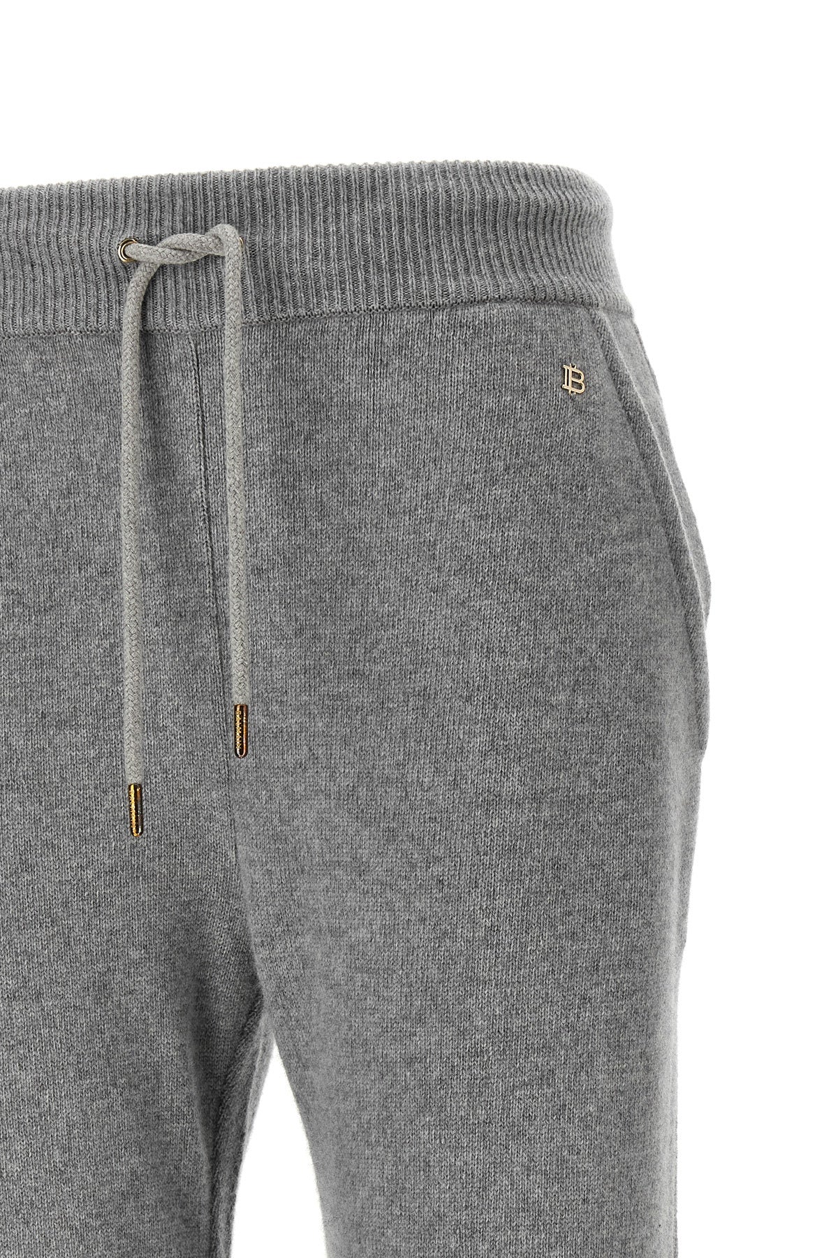 balmain sporty trousers redefine the codes of leisure clothing through a manufac