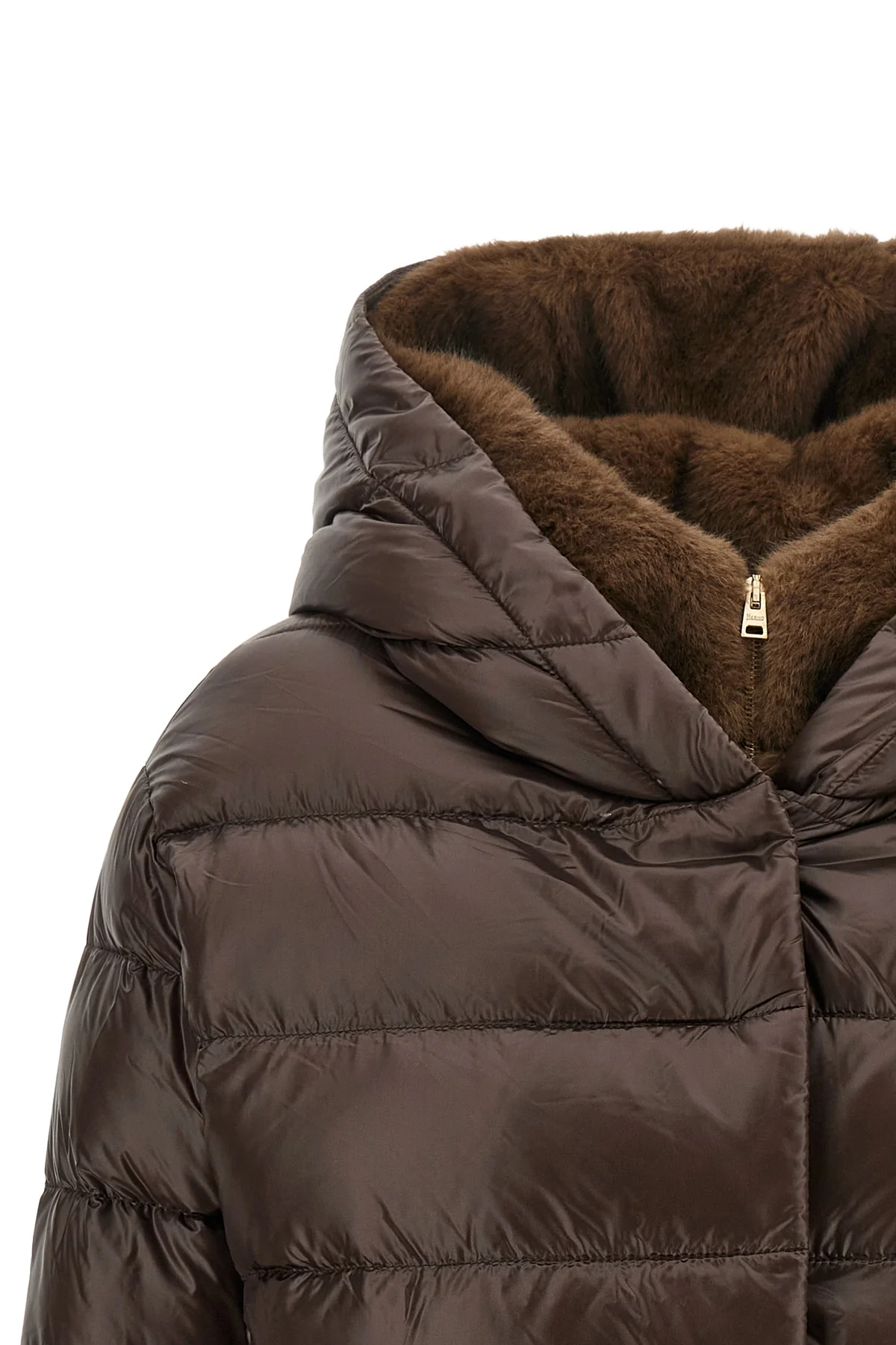 the herno fusciacca down jacket redefines the codes of outerwear through a rel