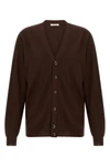 the lemaire cardigan redefines knitwear codes through a deconstructed and innova