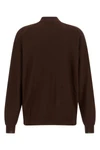 the lemaire cardigan redefines knitwear codes through a deconstructed and innova
