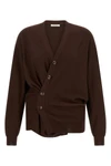 the lemaire cardigan redefines knitwear codes through a deconstructed and innova