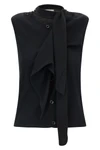 the lemaire vest redefines the codes of knitwear through a deconstructed and inn