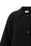 the row ina coat redefines the codes of outerwear through sculptural volumes and