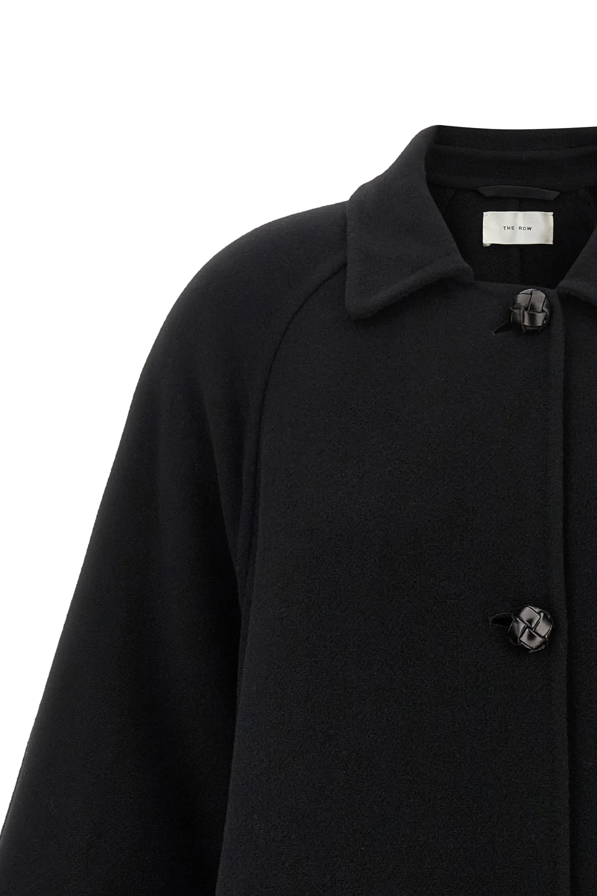 the row ina coat redefines the codes of outerwear through sculptural volumes and