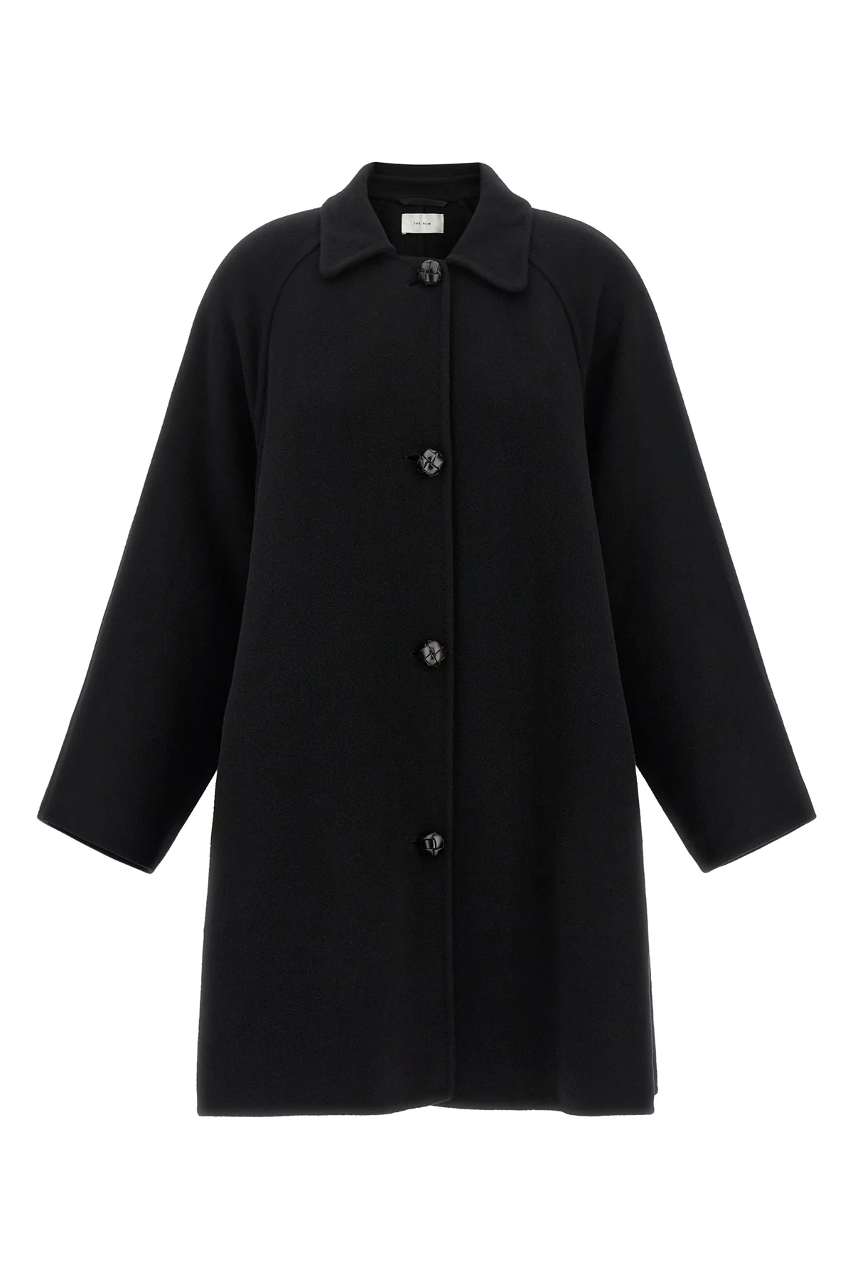 the row ina coat redefines the codes of outerwear through sculptural volumes and