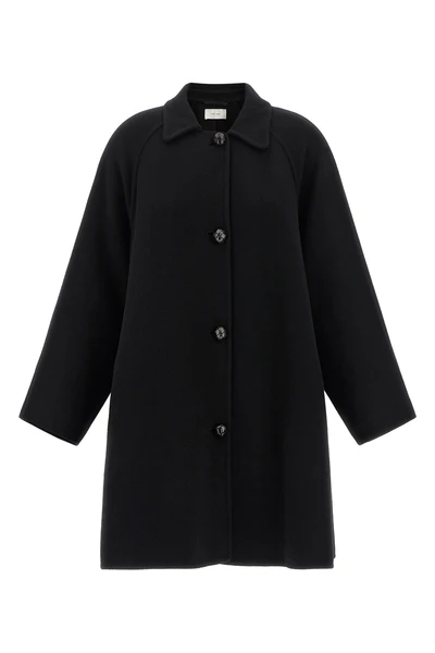 the row ina coat redefines the codes of outerwear through sculptural volumes and