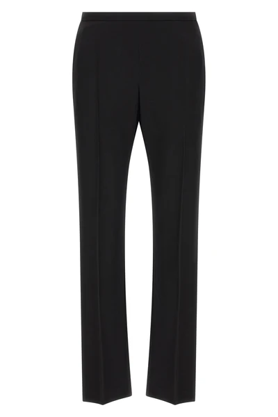 the row cyril trousers embody the essence of silent luxury through impeccable sa