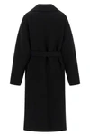 the row ciara coat redefines winter elegance through relaxed volumes and impecca