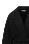 the row ciara coat redefines winter elegance through relaxed volumes and impecca